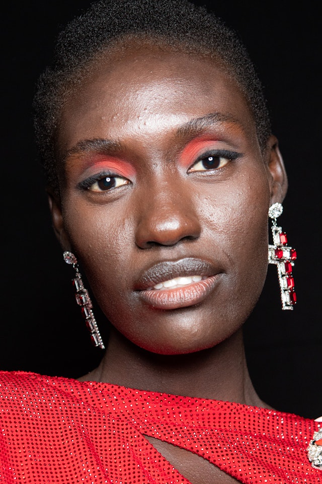 The monochromatic eyeshadow trend on a model backstage.