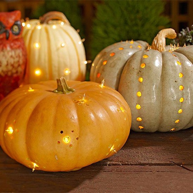 14 Chic Ways To Dress Up Your Pumpkin This Halloween