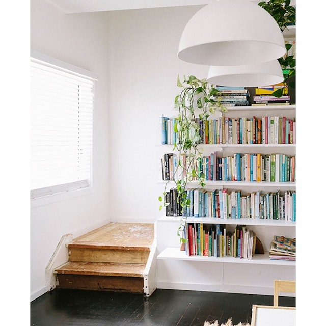 How To Make Your Cluttered Bookshelf Look Stylish